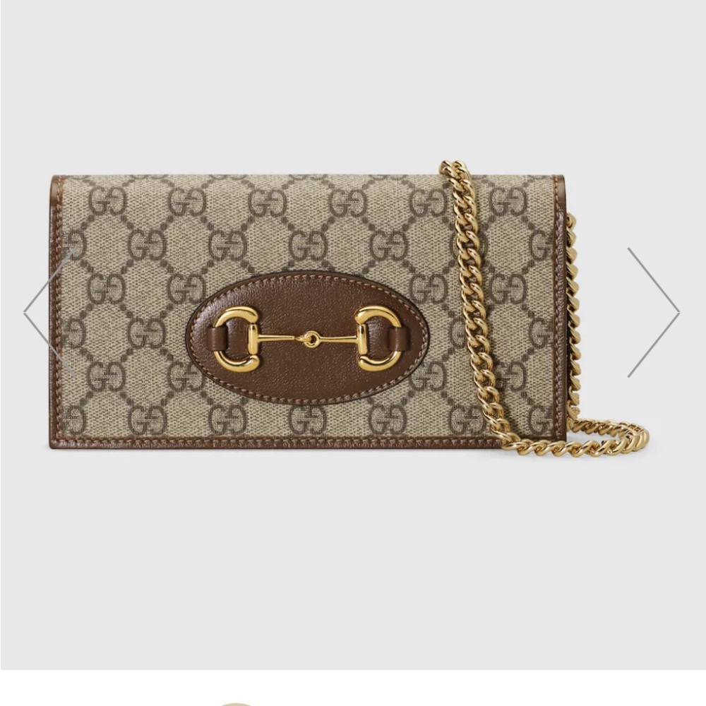 Gucci supreme wallet on chain.